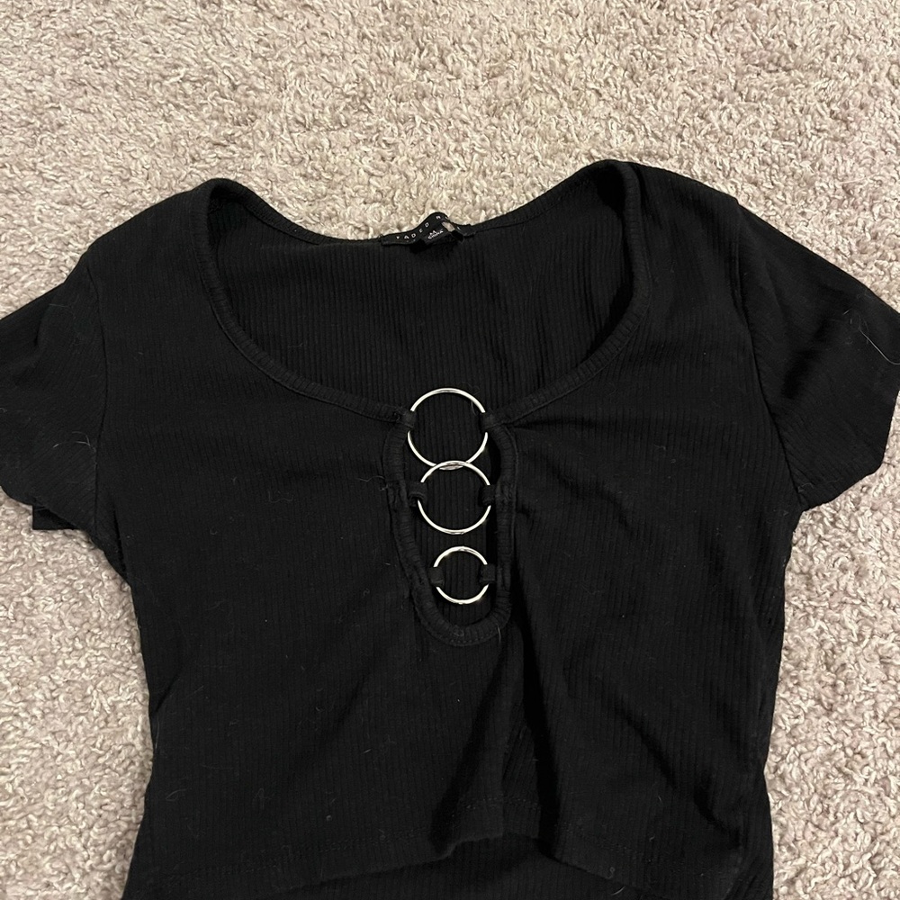 Elegant Black Short Sleeve Top with Ring Accents